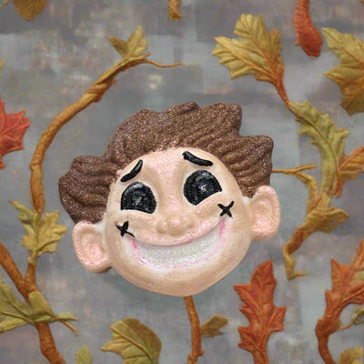 Topher’s Beard and Soap Co. Other Father Bath Bomb – hand-painted Coraline-inspired bath bomb styled with autumn leaves on a neutral surface, capturing a whimsical, fall-themed aesthetic.
