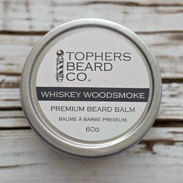 Silver tin of Topher's Beard Co. Whiskey Woodsmoke premium beard balm (60g). Made in Brantford, ON.