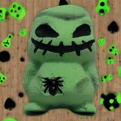 Oogie Boogie bath bomb: hand-painted with spooky details, Sugar Cookie scented, and inspired by The Nightmare Before Christmas. From Tophers Soap Co.
