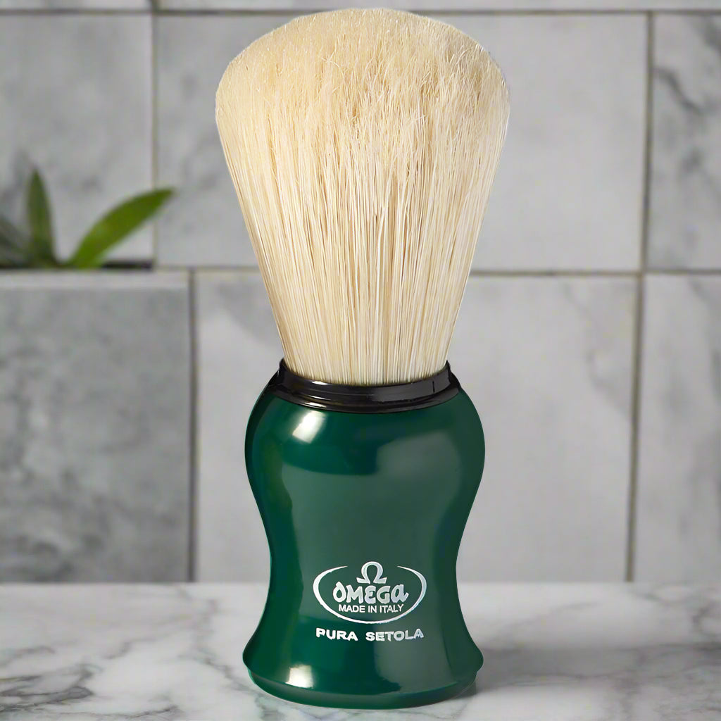 Topher's Beard and Soap Co. Omega Pura Setola Shaving Brush – classic Italian-made boar bristle brush with bright green ergonomic handle, displayed on a marble background