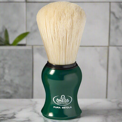 Topher's Beard and Soap Co. Omega Pura Setola Shaving Brush – classic Italian-made boar bristle brush with bright green ergonomic handle, displayed on a marble background