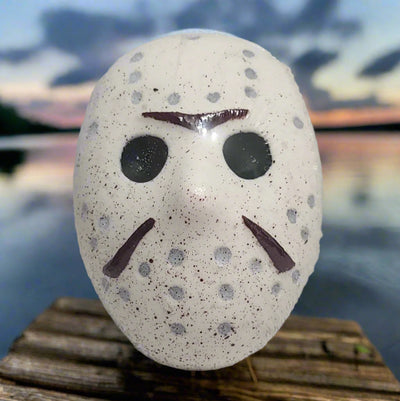 Spooky Jason Vorhees hockey mask bath bomb from Tophers Soap Co., perfect for a fun and eerie bath experience. Handcrafted in Brantford, Ontario.