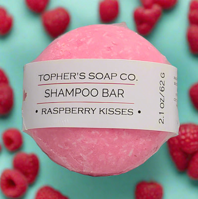 Tophers Soap Co. Raspberry Kisses Shampoo Bar, promising a sweet and fruity hair-washing experience. An eco-friendly, plastic-free hair care solution.
