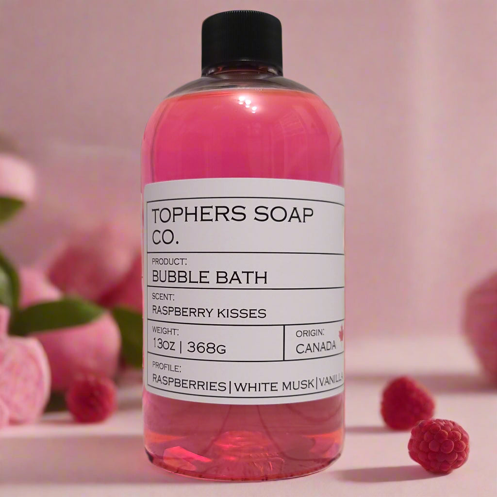 Raspberry Kisses Bubble Bath by Tophers Soap Co., a Canadian-made, SLS and paraben-free formula for a bubbly and skin-loving soak.
