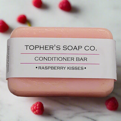 Raspberry Kisses Conditioner Bar from Tophers Soap Co.: long-lasting, zero-waste hair care for soft and shiny locks.