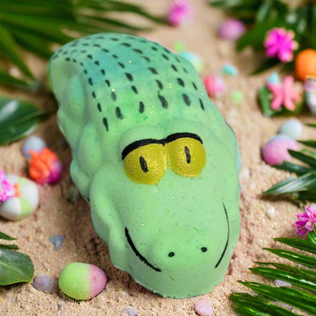 Hand painted alligator bath bomb on white washed table | Tophers Beard and Soap Company