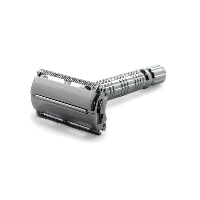 Angled view of the chrome Rockwell R1 Double Edge Safety Razor, a beginner-friendly option from Tophers Soap Co.